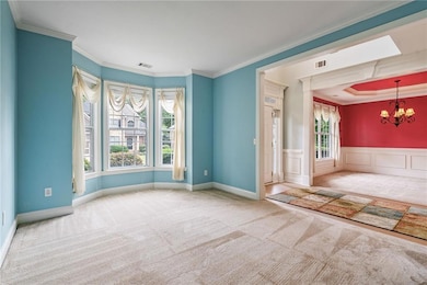 Formal living room with bay window