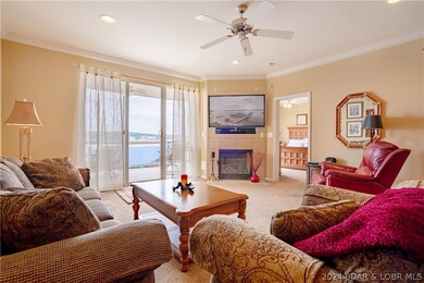 Living room on main level offers gas fp