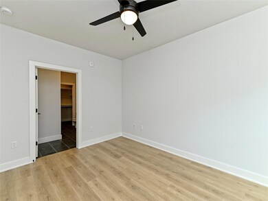 Empty room with light wood-type flooring, a ceili