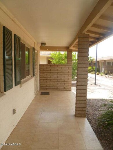 Tiled Front Patio with Room for Chairs!