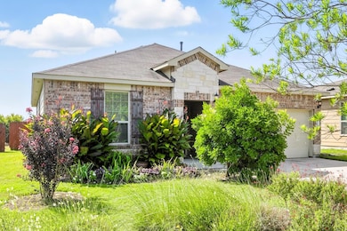 View of front of property featuring brick siding,