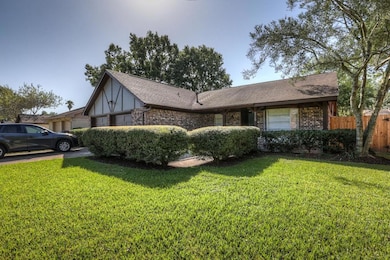 Lush front yard. Boxwoods create a private space f