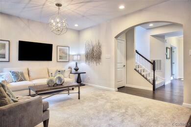Family room opens to kitchen and breakfast nook wi