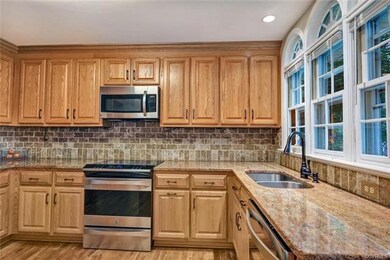 Kitchen features a lot of counter area for food pr