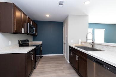 Kitchen with plenty of space to prep, cook, and enjoy meals with family and friends.