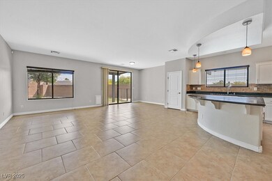 Unfurnished living room featuring visible vents, b