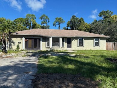 Ranch-style house featuring stucco siding and roof with shingles
