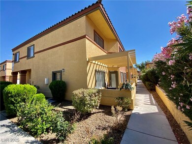 View of side of property featuring stucco siding a