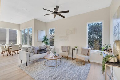 Living area with light wood finished floors, heal