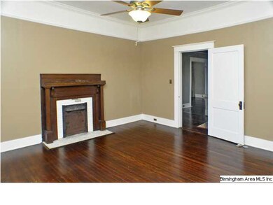 Spacious front bedroom with fireplace!