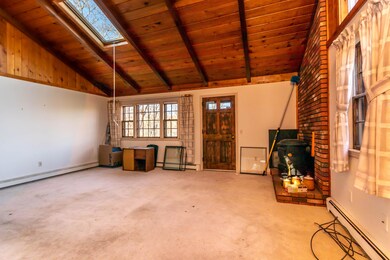 Cathedral living room with skylight