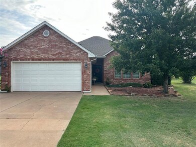 View of front of house featuring a garage and a fr