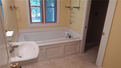 Bright Master bathroom with pocket...