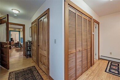 Back hallway has ample closet storage