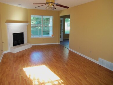 The spacious Living Room has new laminate flooring