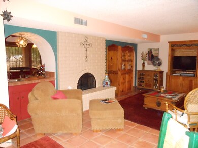Livingroom with wetbar & fireplace!