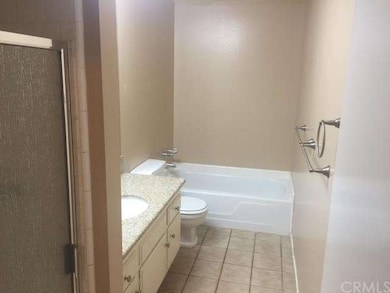 Bathroom has separate shower and tub