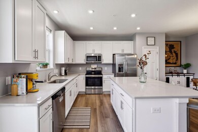 Light and bright kitchen w/ stunning white cabinetry, Cambria countertops, SS appliances!