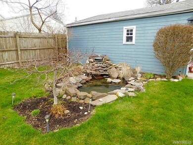 Backyard. BEAUTIFUL UPDATED POND.