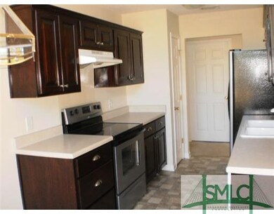 Kitchen. STAINLESS STEEL RANGE & REFRIGERATOR!