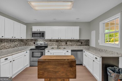 11118 City Pond Rd, Covington, GA 30014 - photo 2