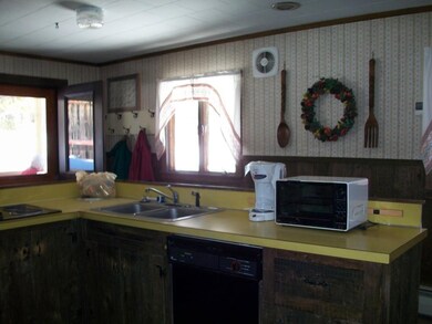 Kitchen has lots of storage with...