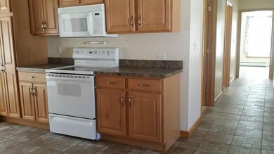 kitchen looking down the hall toward...