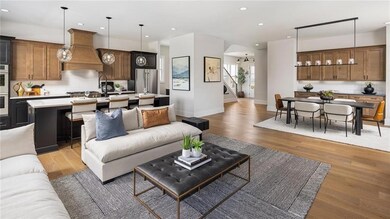 Open concept floorplan, perfect for entertaining with ease. Photos are of the Tallulah Model Home and are not representative of actual home. Designer features may vary.