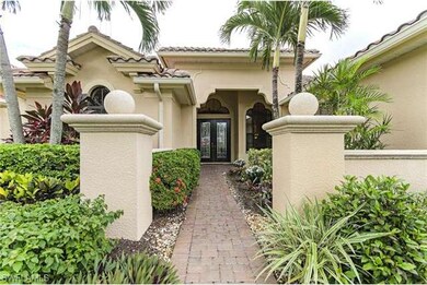 Welcoming entrance up the brick paver steps invite