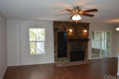 Open concept living room off the kitchen opens to 