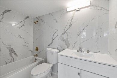 FULLY RENOVATED W/WALL OF TILES
