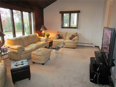 Living room with large picture window to bring in