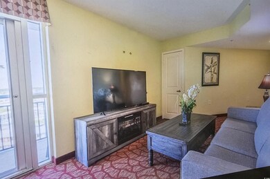 Living area featuring baseboards