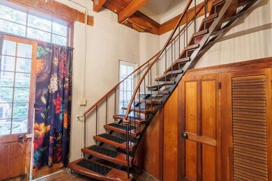 Gorgeous original details like french doors and a