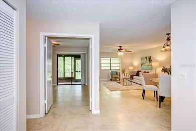 Foyer with entry closet leads to great room with 2