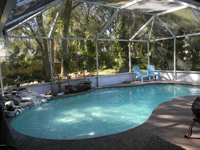 screened in pool and deck