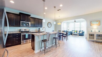 Granite counters and upgraded cabinets with SS appliances