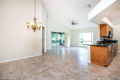 Dining/Living Area with Vaulted Ceiling