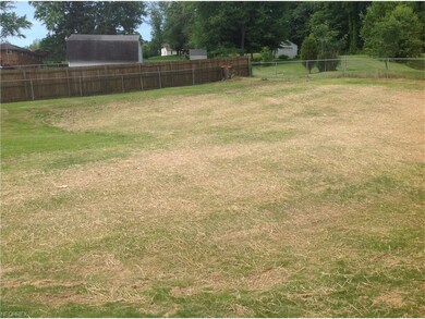 view of huge yard mostly fenced