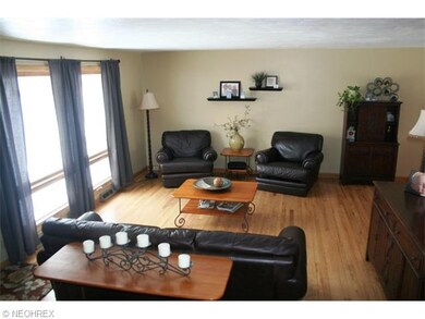 Enter into bright and sunny living room with slate