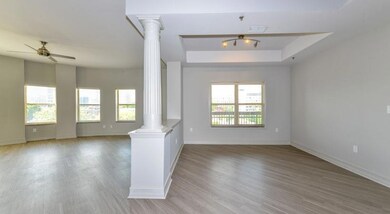 Spare room with ceiling fan, hardwood / wood-style