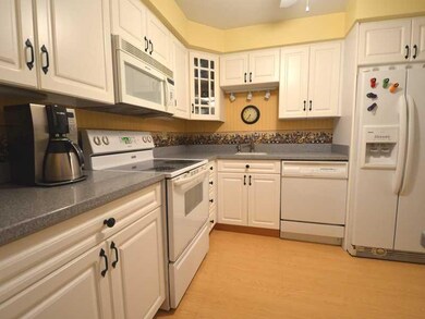 Kitchen. Newer kitchen with Corian counters, lamin