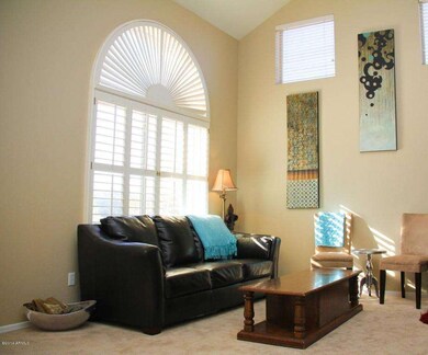 1440 E Behrend Dr- Living Room (2) - Cop