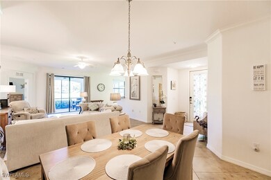 Tiled dining area with ornamental molding, a firep