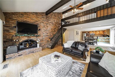 View of gas fireplace and feature wall.
