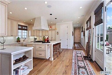 Custom cabinetry, walnut floors, numerous French d