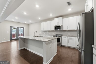 246 Round Pond Dr, Lilburn, GA 30047 - photo 7