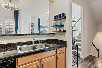 Look out from the kitchen to the family room and d