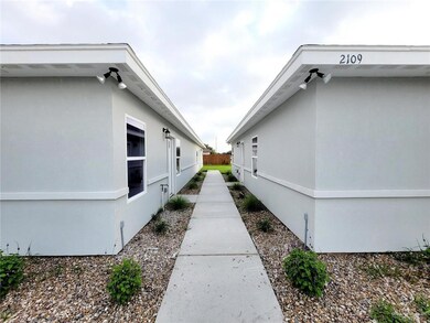 View of side of property with stucco siding