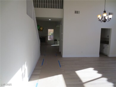 Dining space with visible vents, baseboards, light